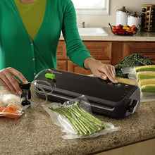 Load image into Gallery viewer, FoodSaver Vacuum Sealer System with Starter Bags &amp; Rolls
